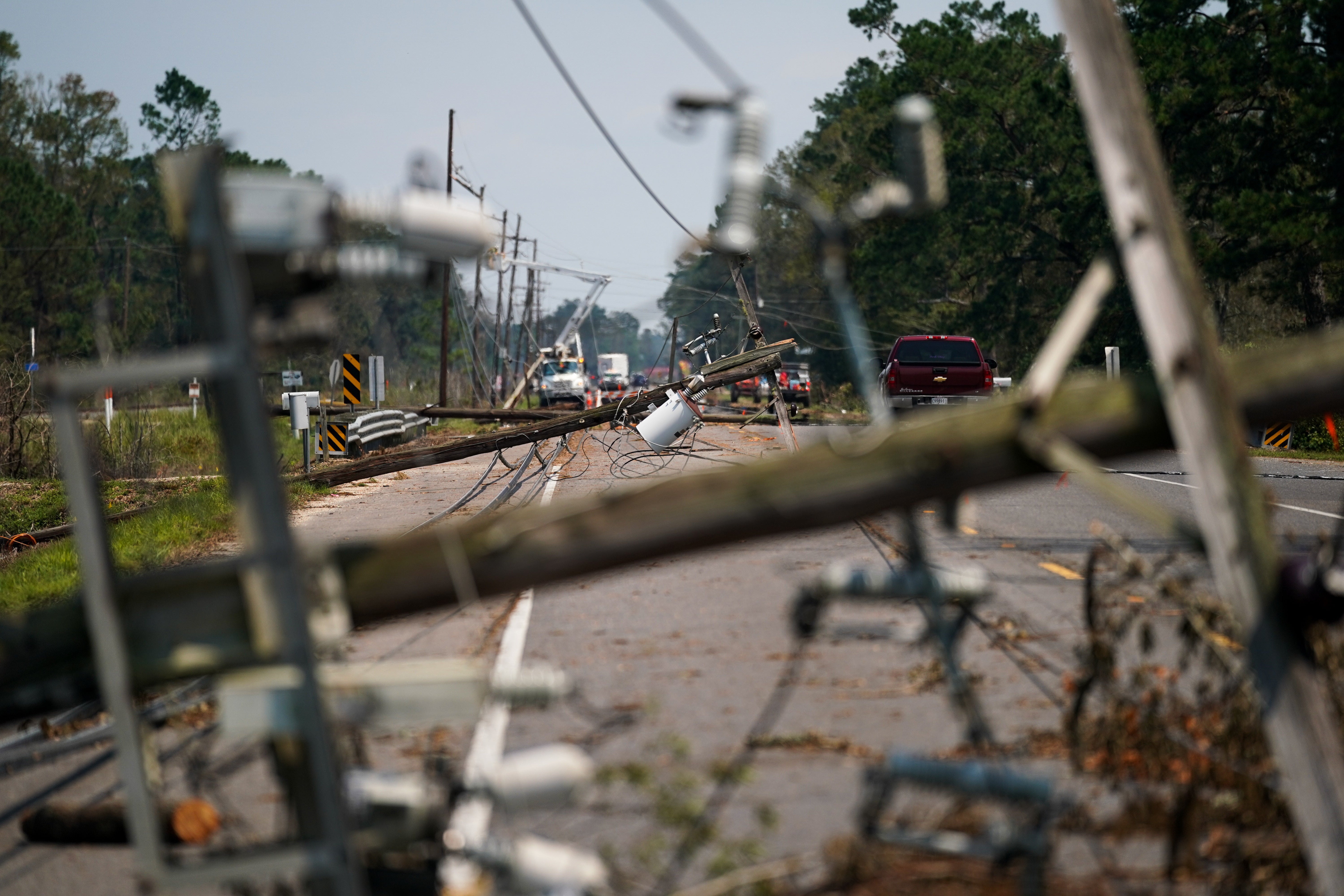Utility poles and transmission lines collapsed across south Louisiana during Hurricane Ida, stranding thousands of residents without power for days or weeks.
