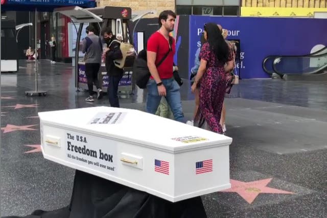 <p>A coffin was installed on Donald Trump’s Hollywood star by artist ‘Plastic Jesus’ </p>
