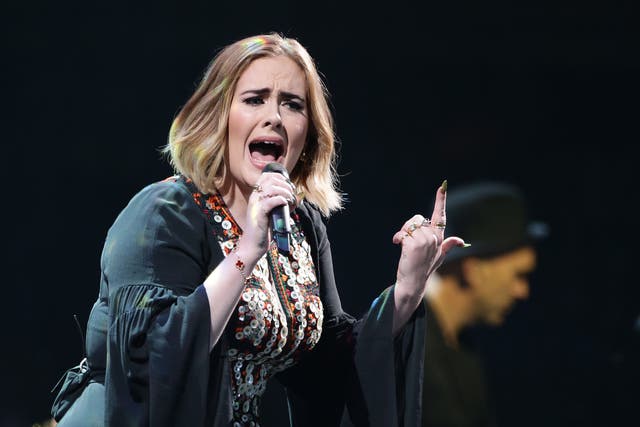 Adele performing on stage at the Glastonbury Festival (PA)