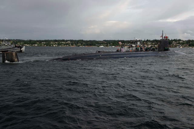 <p>The USS Connecticut submarine, pictured departing Washington in May, was involved in a underwater collision in the South China sea. </p>