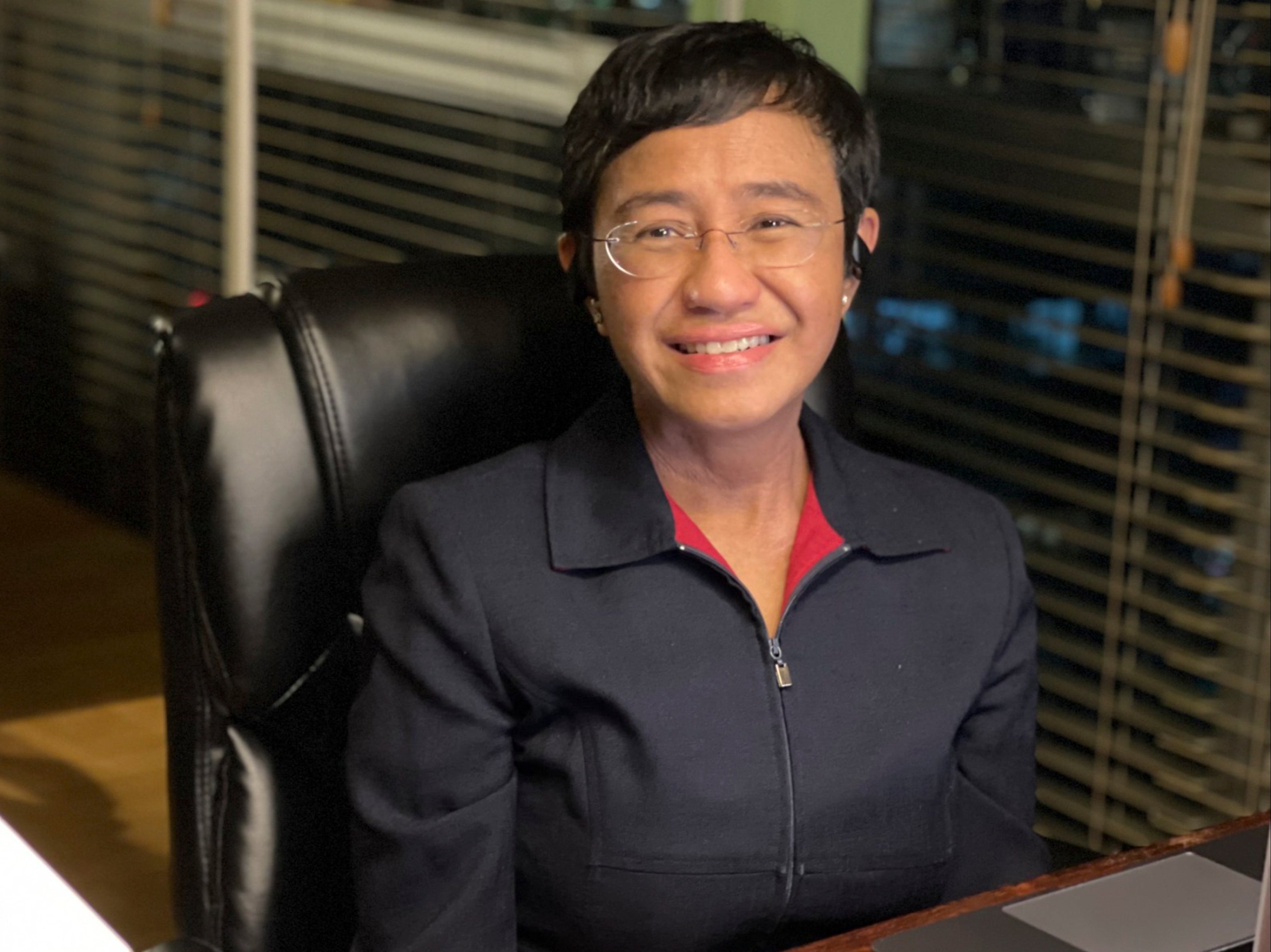 Rappler editor Maria Ressa reacts on hearing that she has been awarded the Nobel Peace Prize