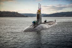 Damaged US sub in port after collision in South China Sea