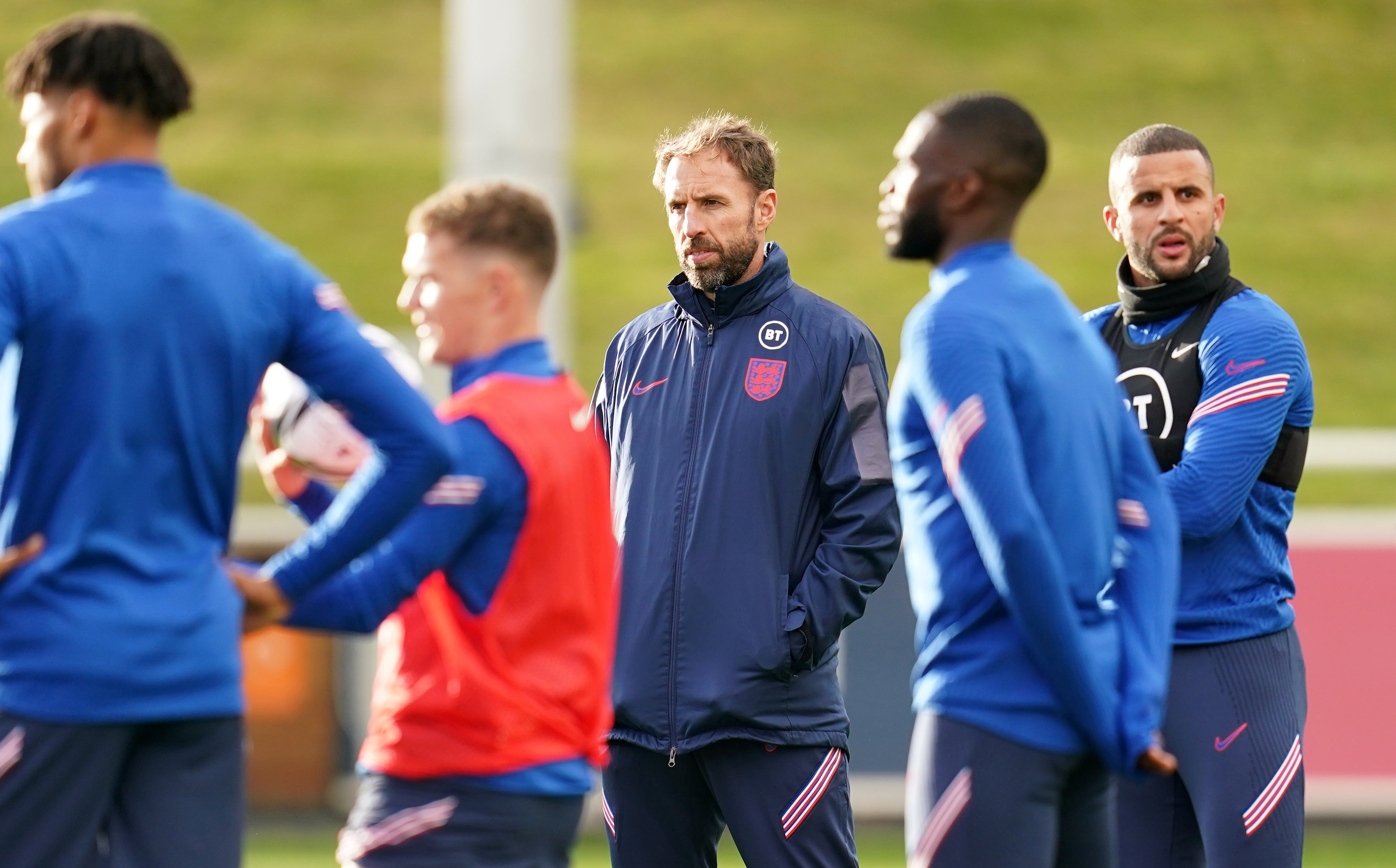 Gareth Southgate (centre) admits young footballers may be more susceptible to “conspiracy theories” around vaccination (Nick Potts/PA)