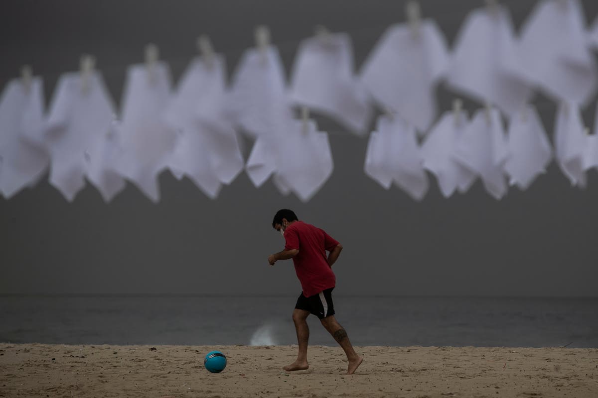 Brazilians seek pre-pandemic normalcy as deaths top 600,000 Brazilians seek pre-pandemic normalcy as deaths top 600,000