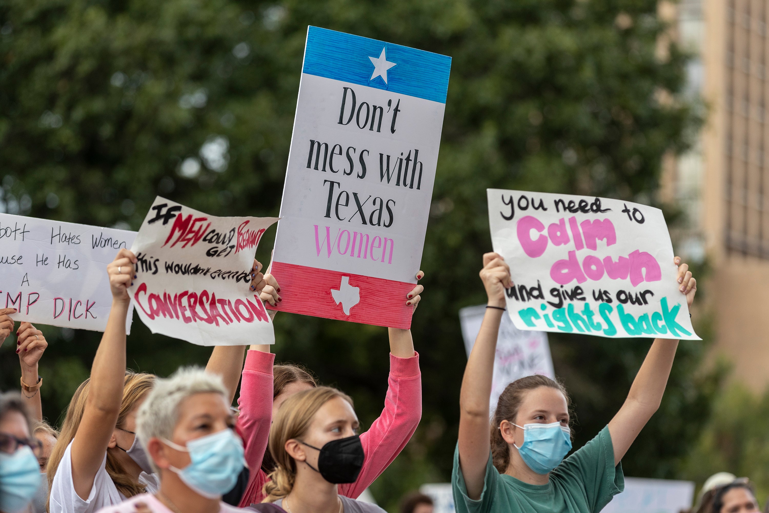 People attend the Women’s March ATX rally, at the Texas State Capitol in Austin, Texas.