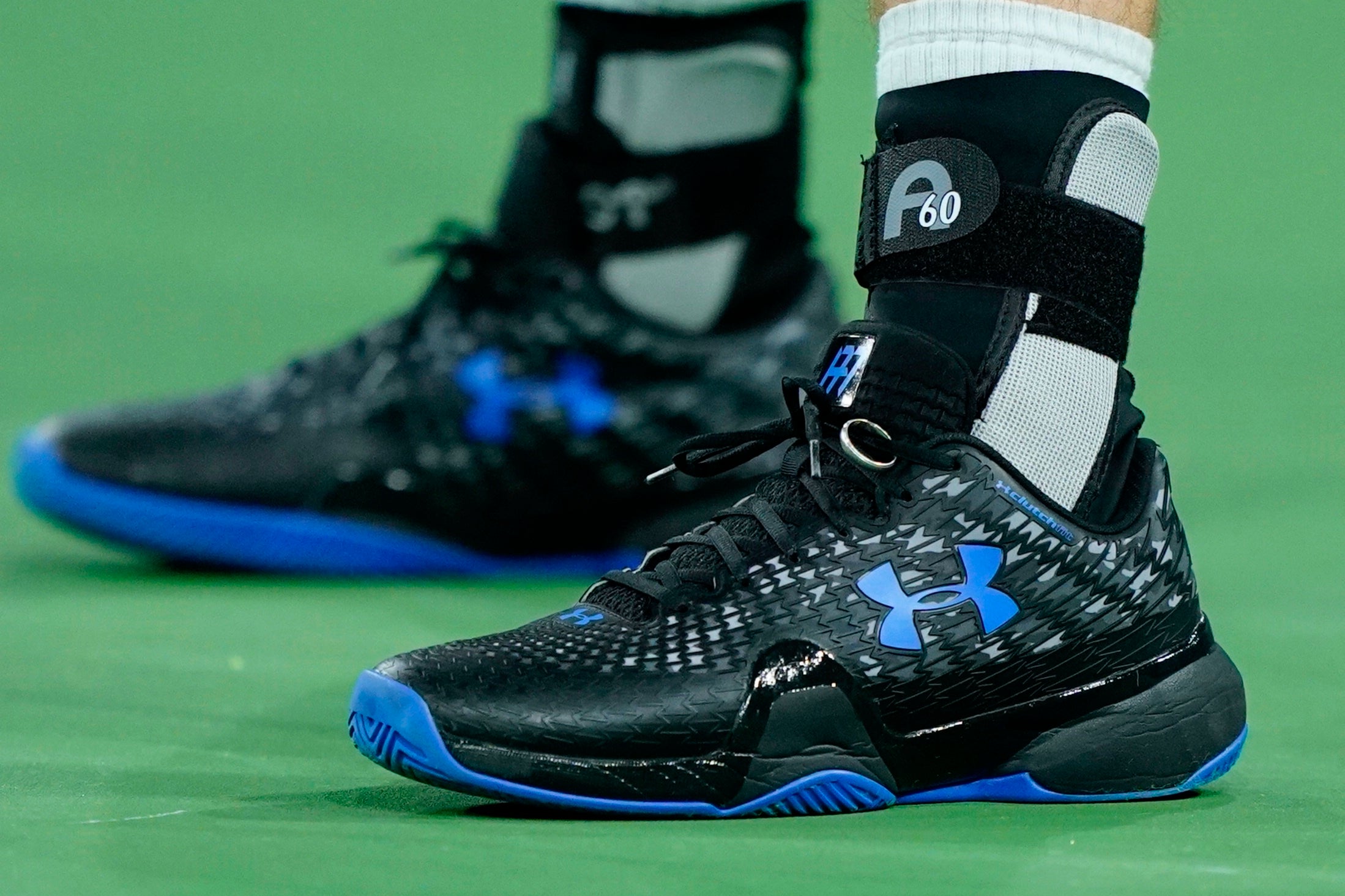 Andy Murray’s wedding ring was back on his trainers as he took on Adrian Mannarino (Mark J. Terrill/AP)