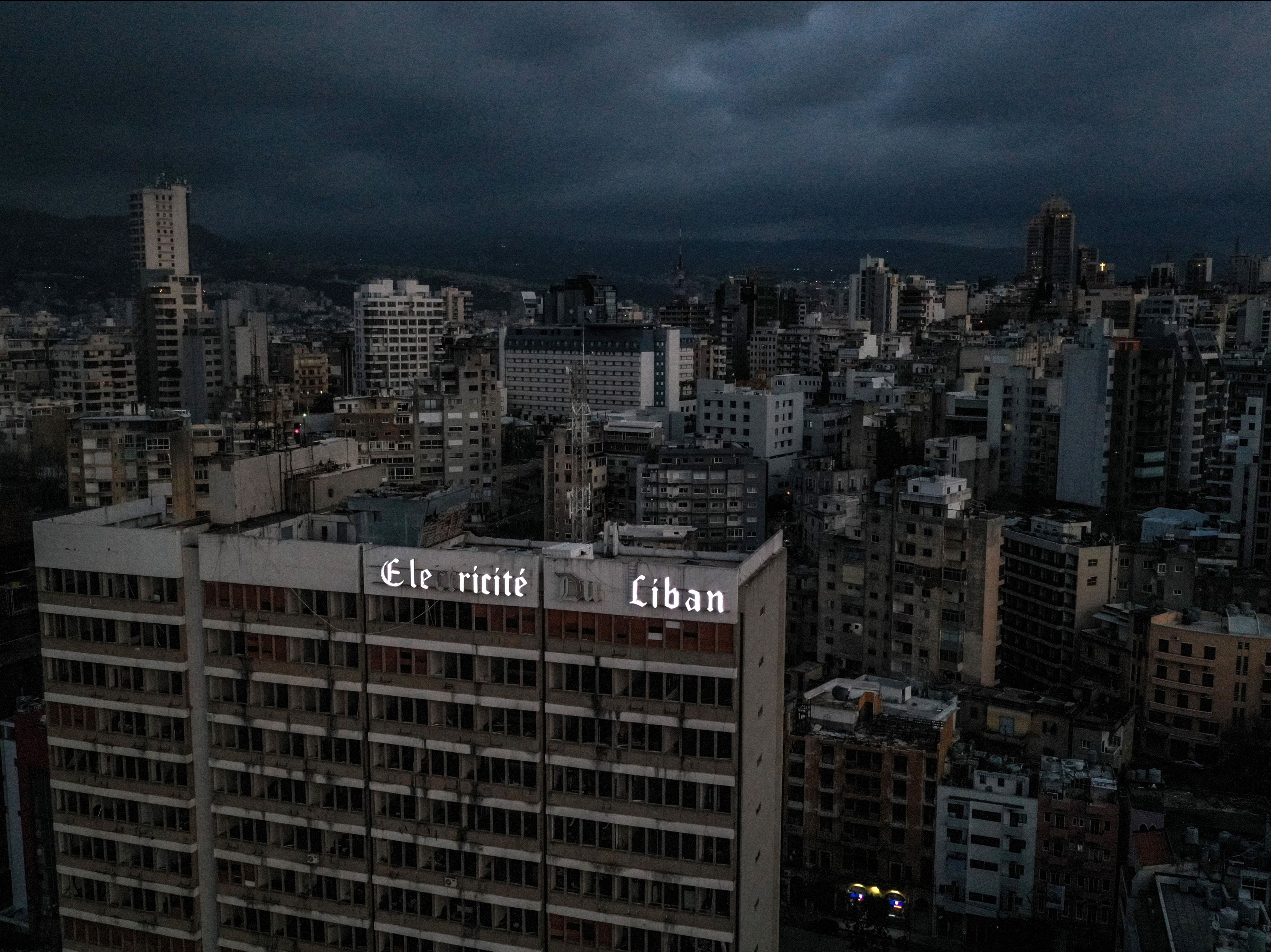 An aerial view shows Lebanon’s capital Beirut in darkness during power outage on 3 April