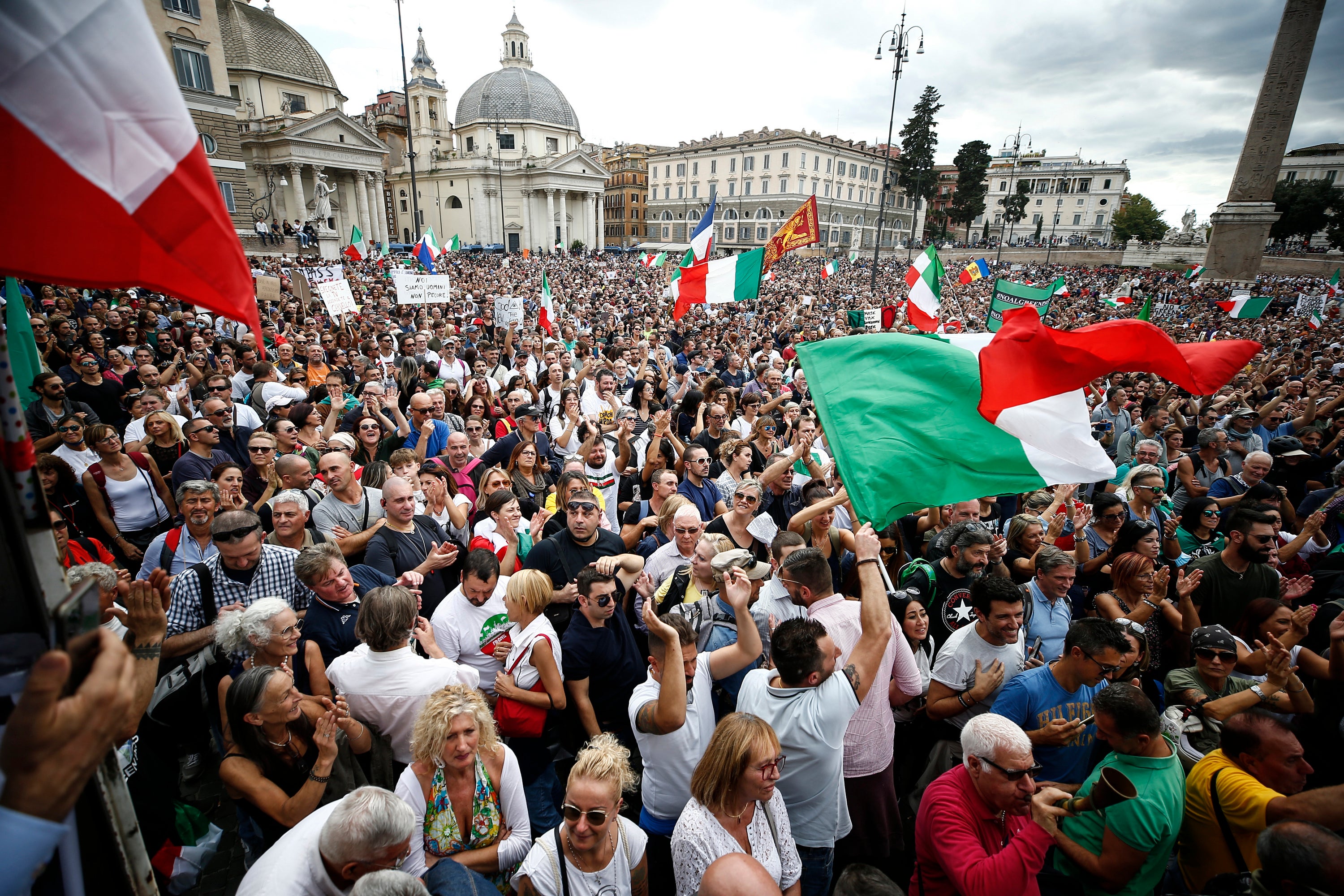 Thousands march in Rome to protest workplace vaccine rule | The Independent