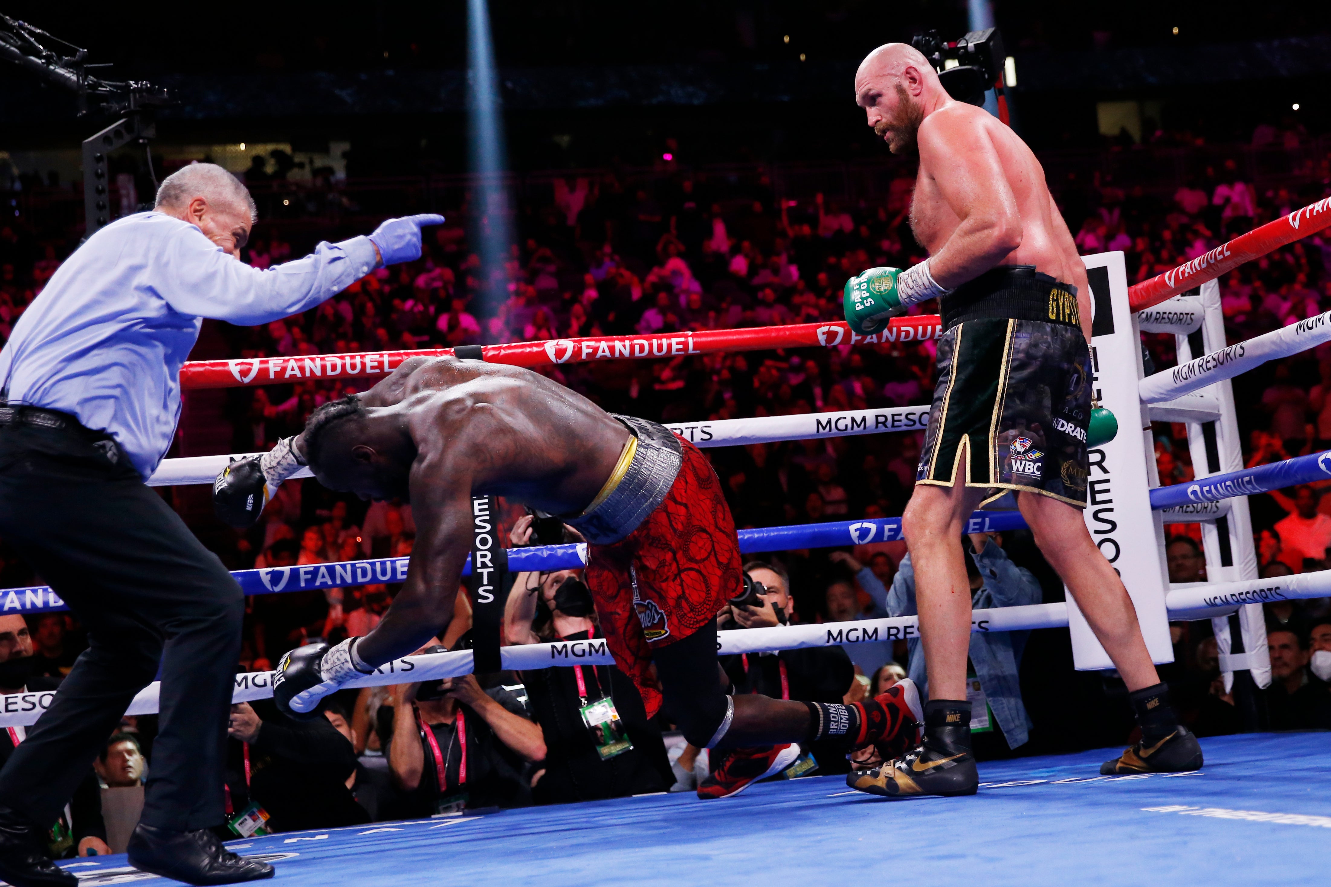 Tyson Fury knocks out Deontay Wilder to win in the 11th round of their trilogy fight (Chase Stevens/AP)