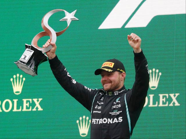 <p>Valtteri Bottas celebrates his first race win of the season</p>