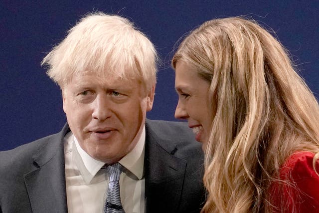 <p>Boris Johnson with his wife Carrie Johnson at Tory Party conference last week</p>