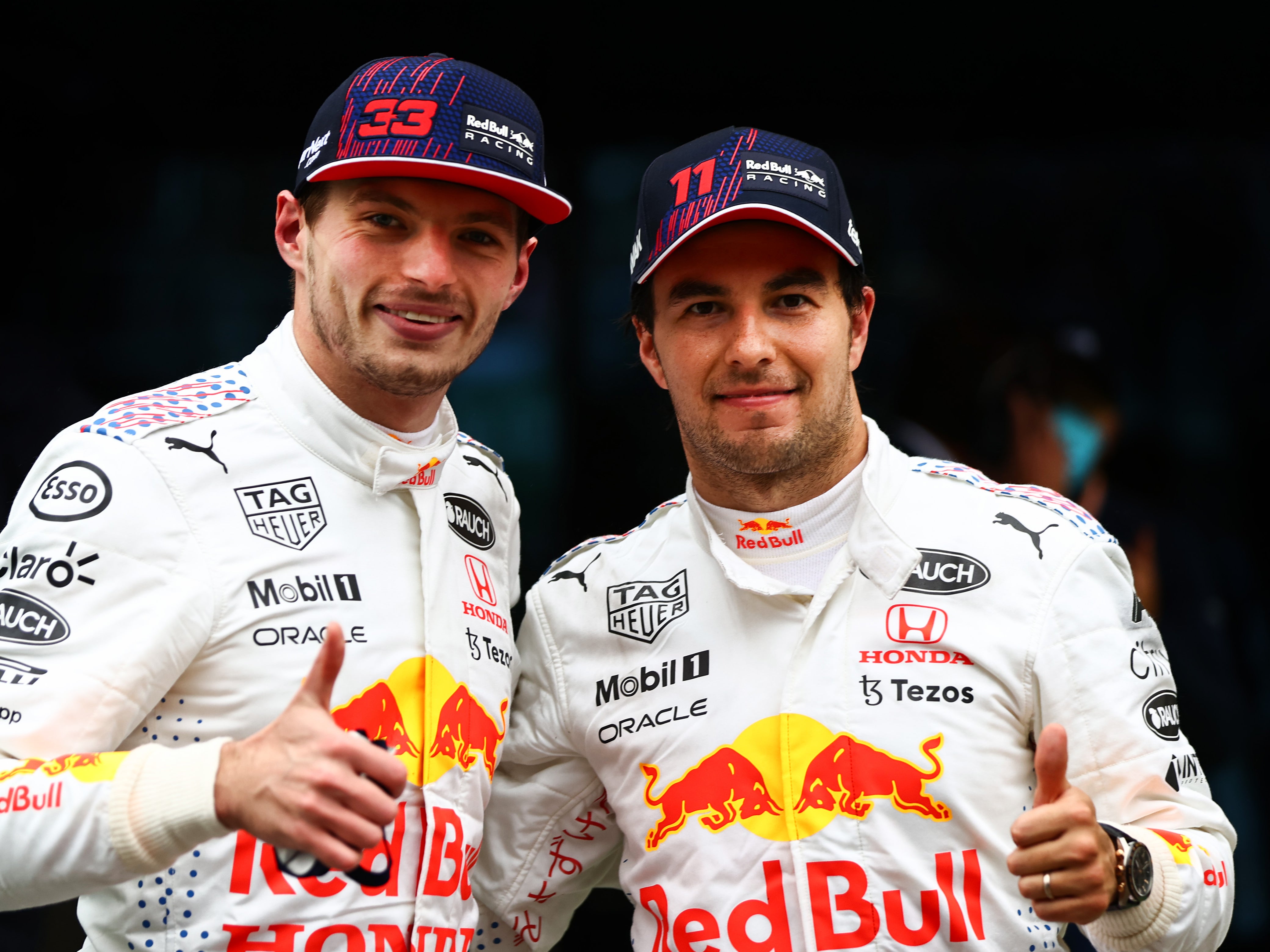 Red Bull teammates Max Verstappen (left) and Sergio Perez