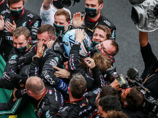<p>Valtteri Bottas is congratulated by Mercedes staff in Istanbul</p>