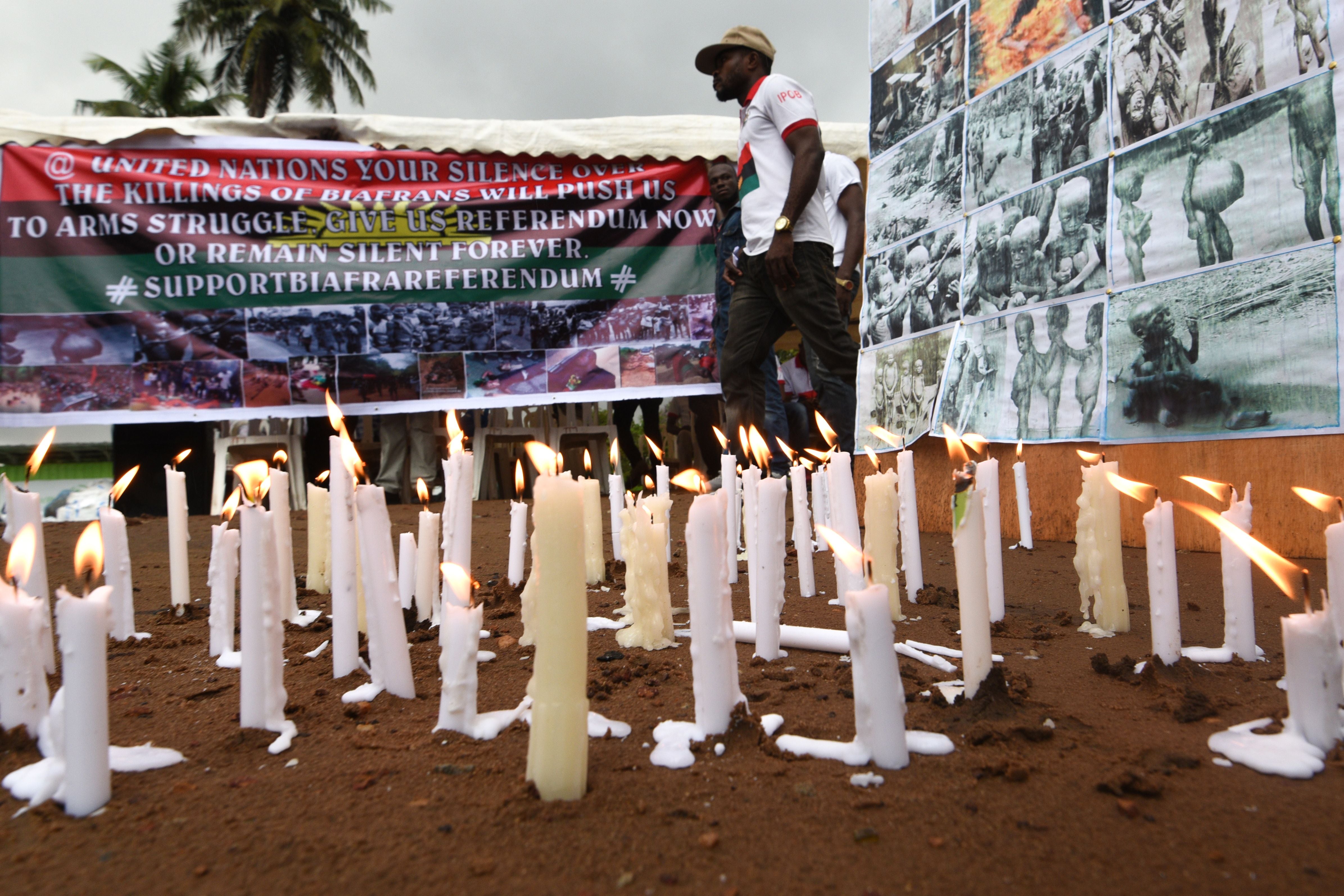 Banners and candles are displayed in Abidjan during a ceremony commemorating the Biafran war from 1967 to 1970