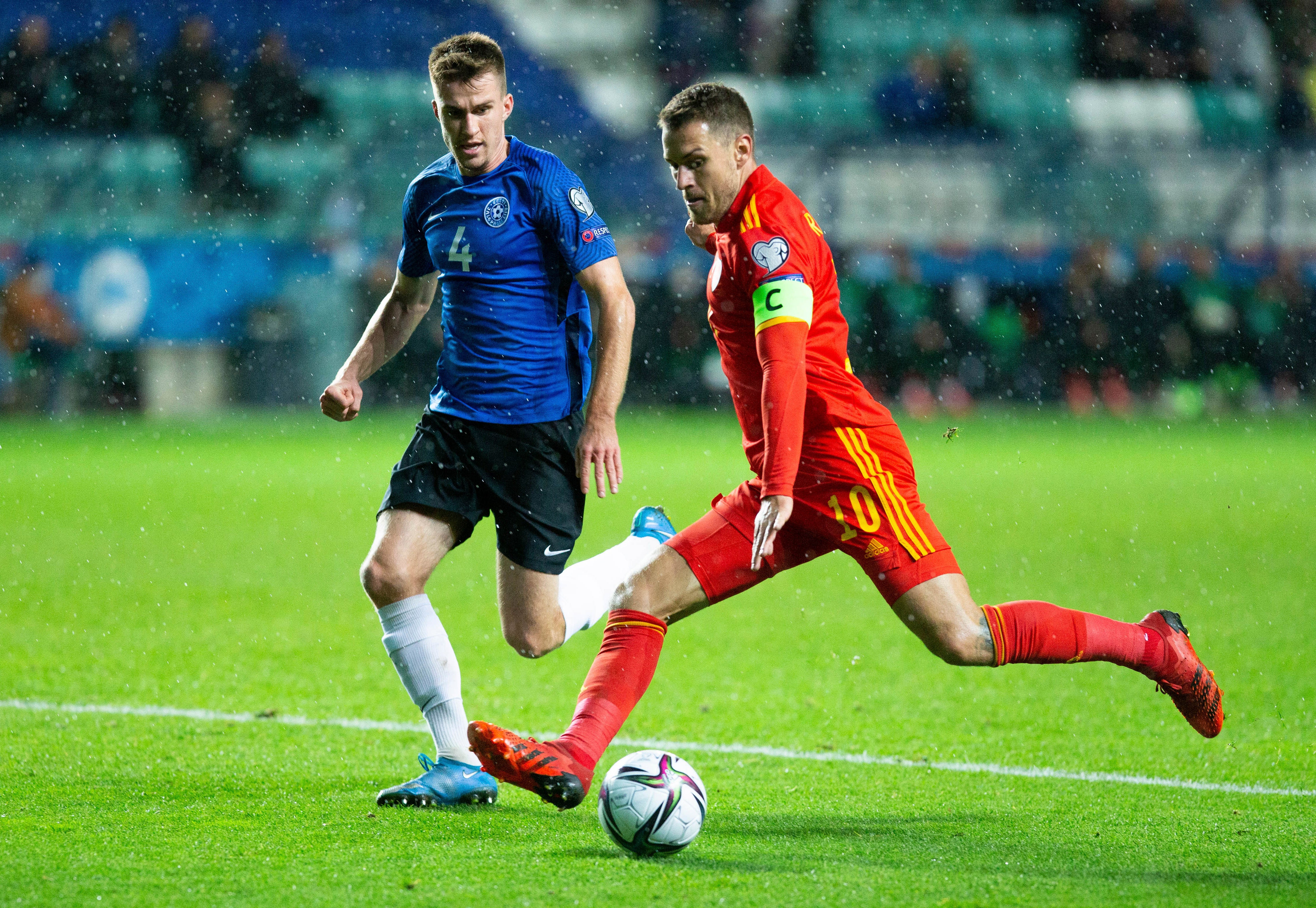 Aaron Ramsey, right, praised Wales’ resilience after their hard-fought 1-0 World Cup qualifying victory in Estonia (Raul Mee/AP)