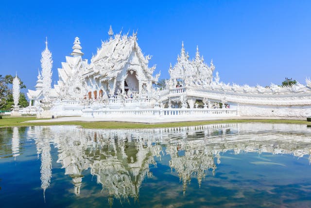 Wat Rong Khun Temple is in Chiang Rai in northern Thailand (Alamy/PA)