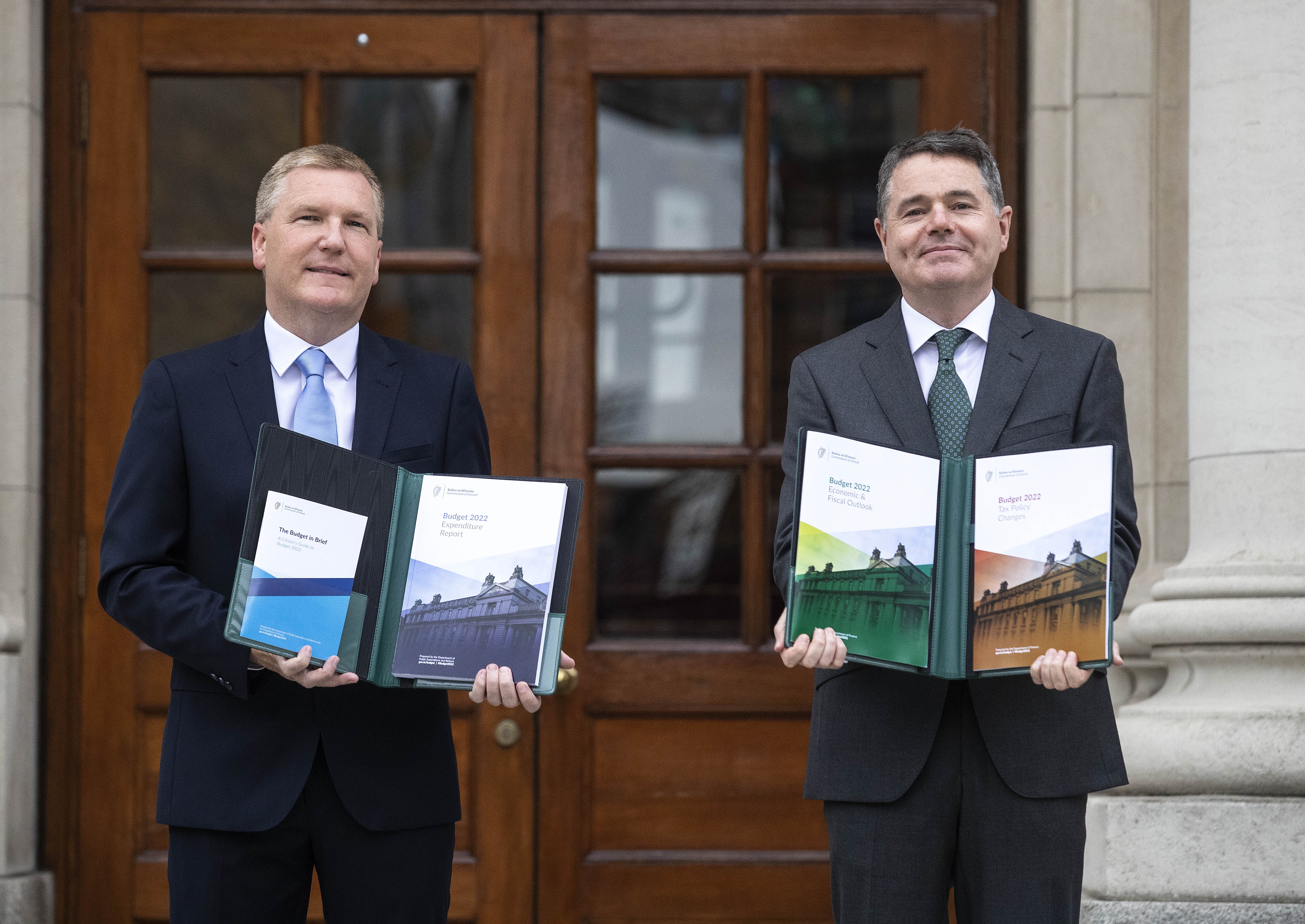 Minister for Finance Paschal Donohoe (right) and Minister for Public Expenditure and Reform Michael McGrath arrive at Government Buildings to unveil the Government’s Budget for 2022 (Damien Eagers/PA)
