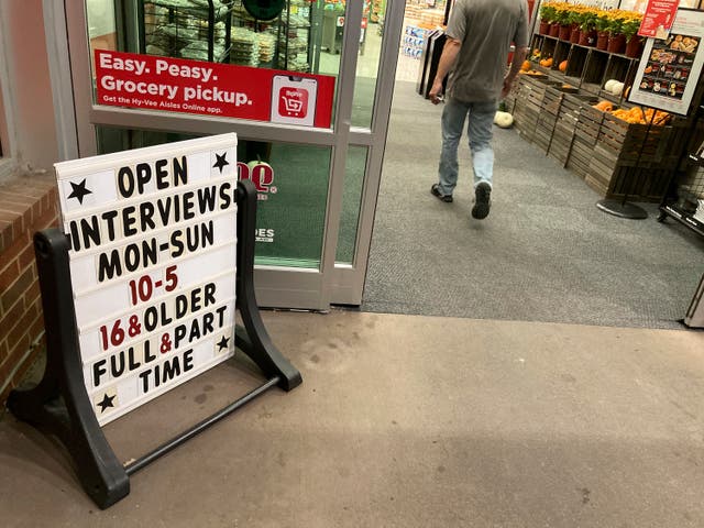 <p>File: A sign advertising jobs outside a Hy-Vee grocery store in Sioux Falls, South Dakota. A company representative told <em>The Independent</em> that recruitment for the security force was by a ‘select process’ and not by open interview.     </p>