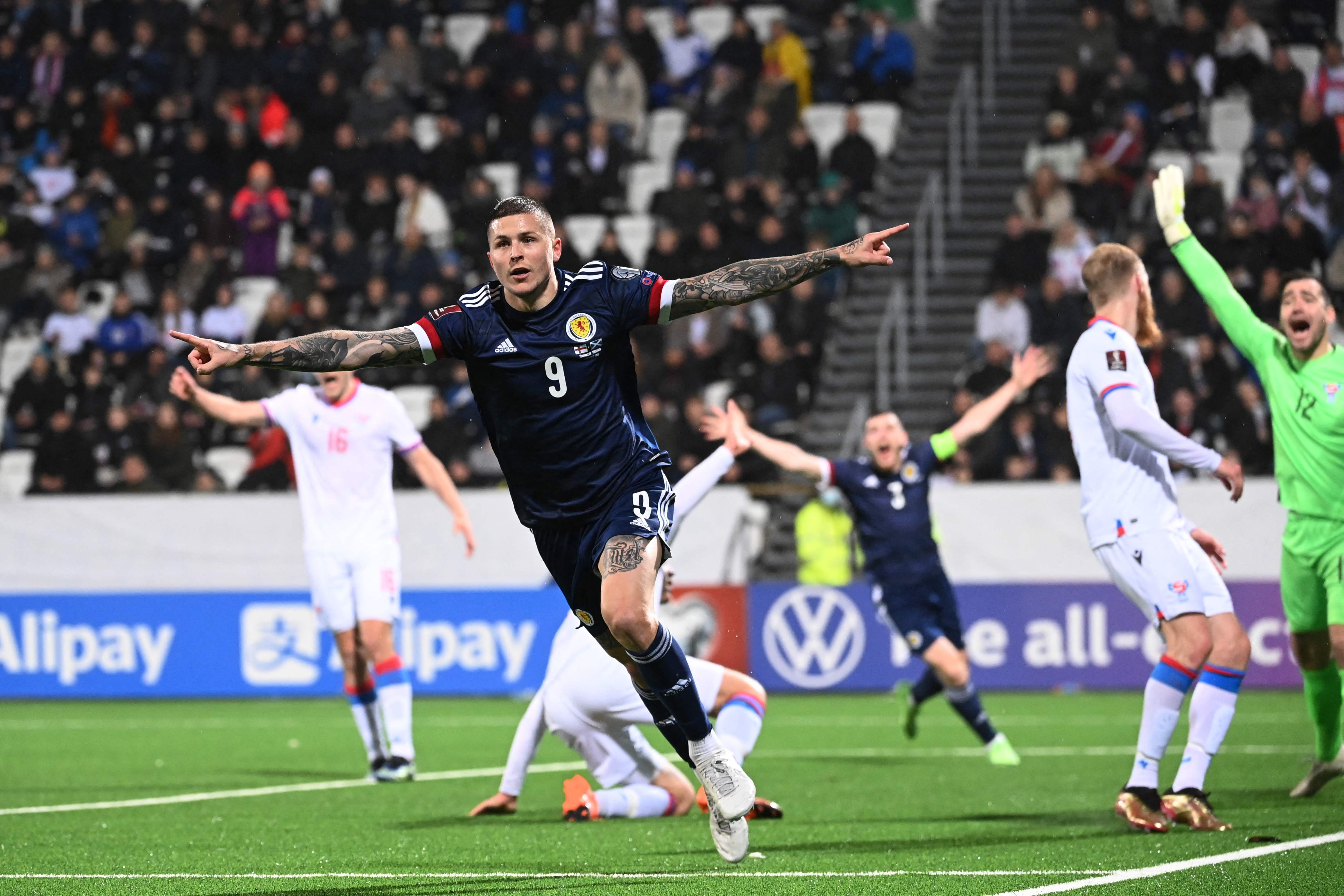 Lyndon Dykes celebrates scoring Scotland’s late winner