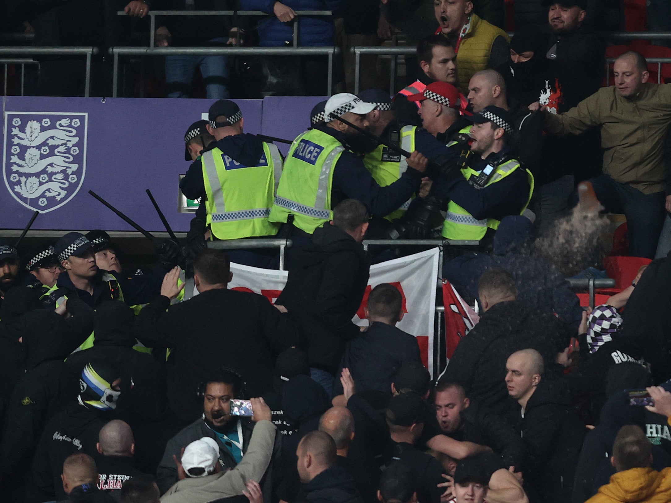 Hungary fans clash with police during the 2022 FIFA World Cup Qualifier match between England and Hungary at Wembley Stadium