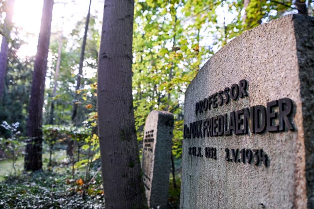 <p>This 12 October 2021 taken photo shows the grave of Max Friedlaender, a musicologist of Jewish faith at the Suedwestkirchhof Stahnsdorf, Germany. The German government's top official against antisemitism on Wednesday criticized the burial of a Holocaust denier on the former gravesite of a known Jewish musicologist</p>