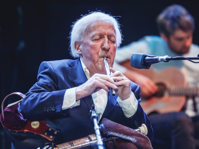 <p>As the lineup shifted over the years, Moloney remained a constant in the band, playing the tin whistle and uilleann pipes </p>