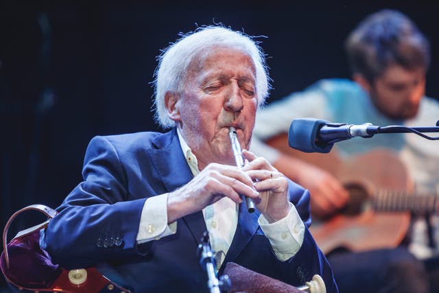 <p>As the lineup shifted over the years, Moloney remained a constant in the band, playing the tin whistle and uilleann pipes </p>