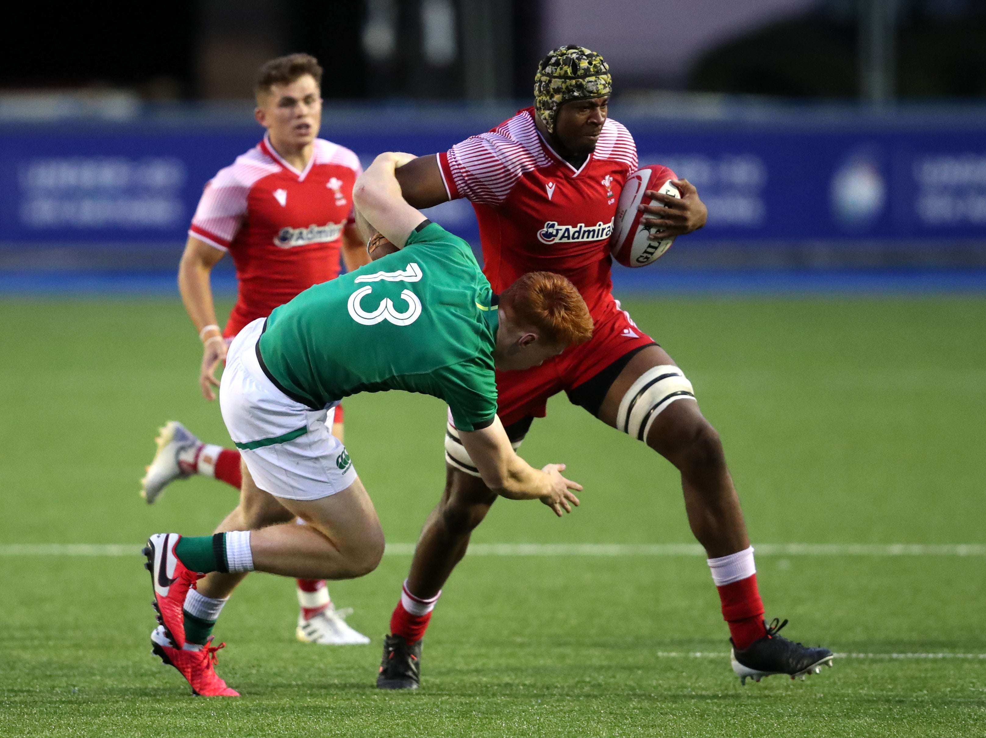 Christ Tshiunza carries the ball while in action for Wales Under-20s (David Davies/PA)