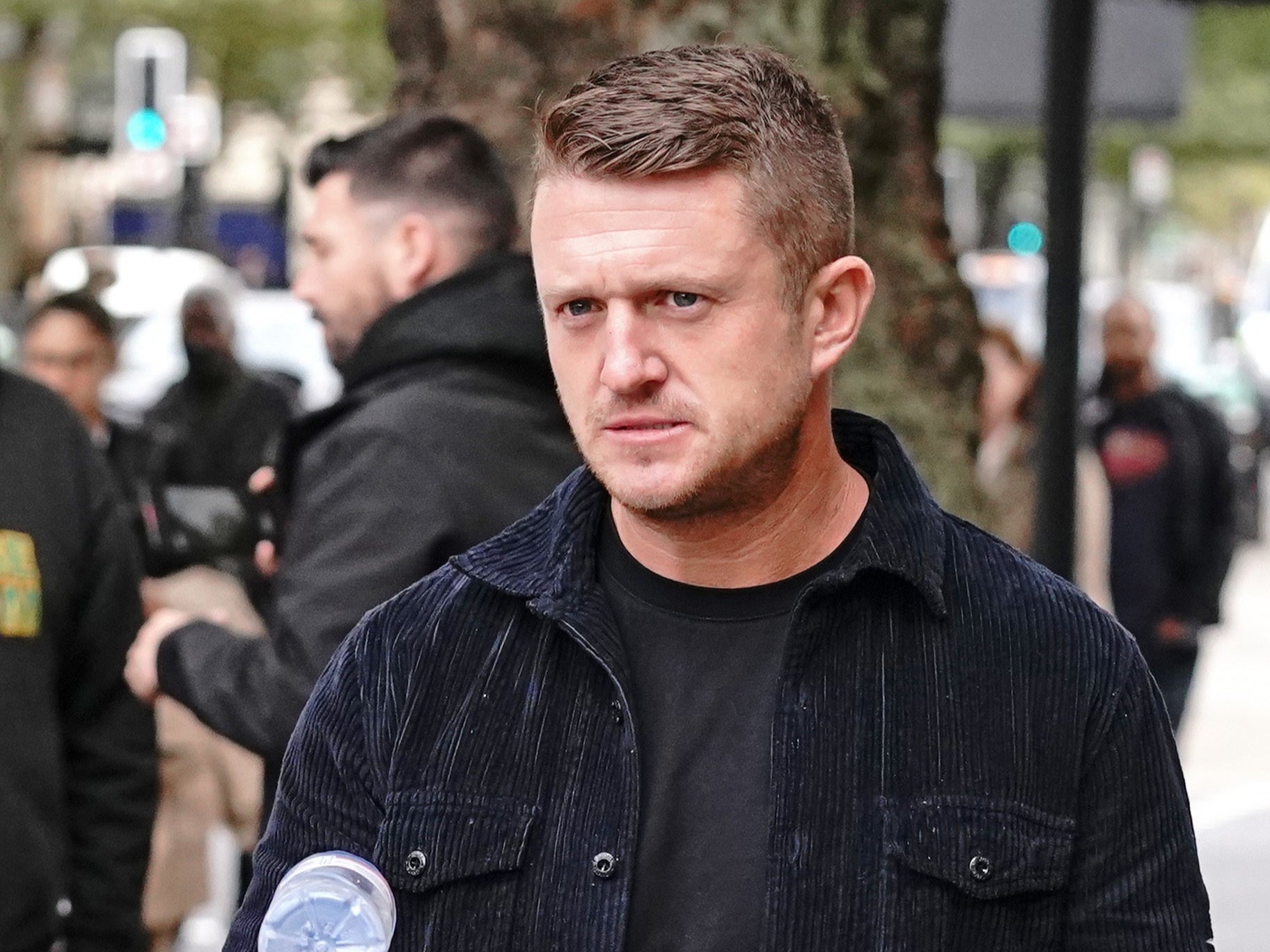 Tommy Robinson has been handed a five-year stalking ban after turning up at the home of an Independent journalist