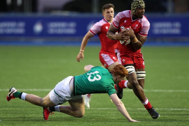 Christ Tshiunza in action for Wales Under-20s (David Davies/PA).