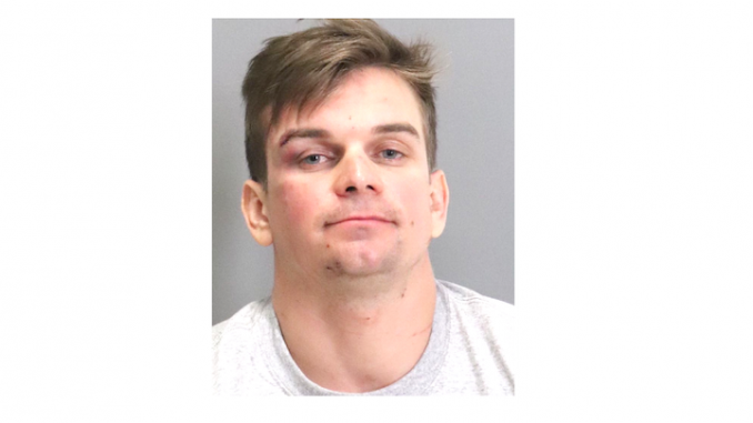 A mugshot of Alexander Joseph Furrier, who is accused of anti-gay hate crimes and attacking a police dog.