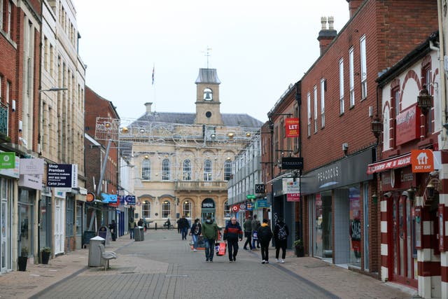 <p>Shoppers on the high street in Loughborough, Leicestershire </p>