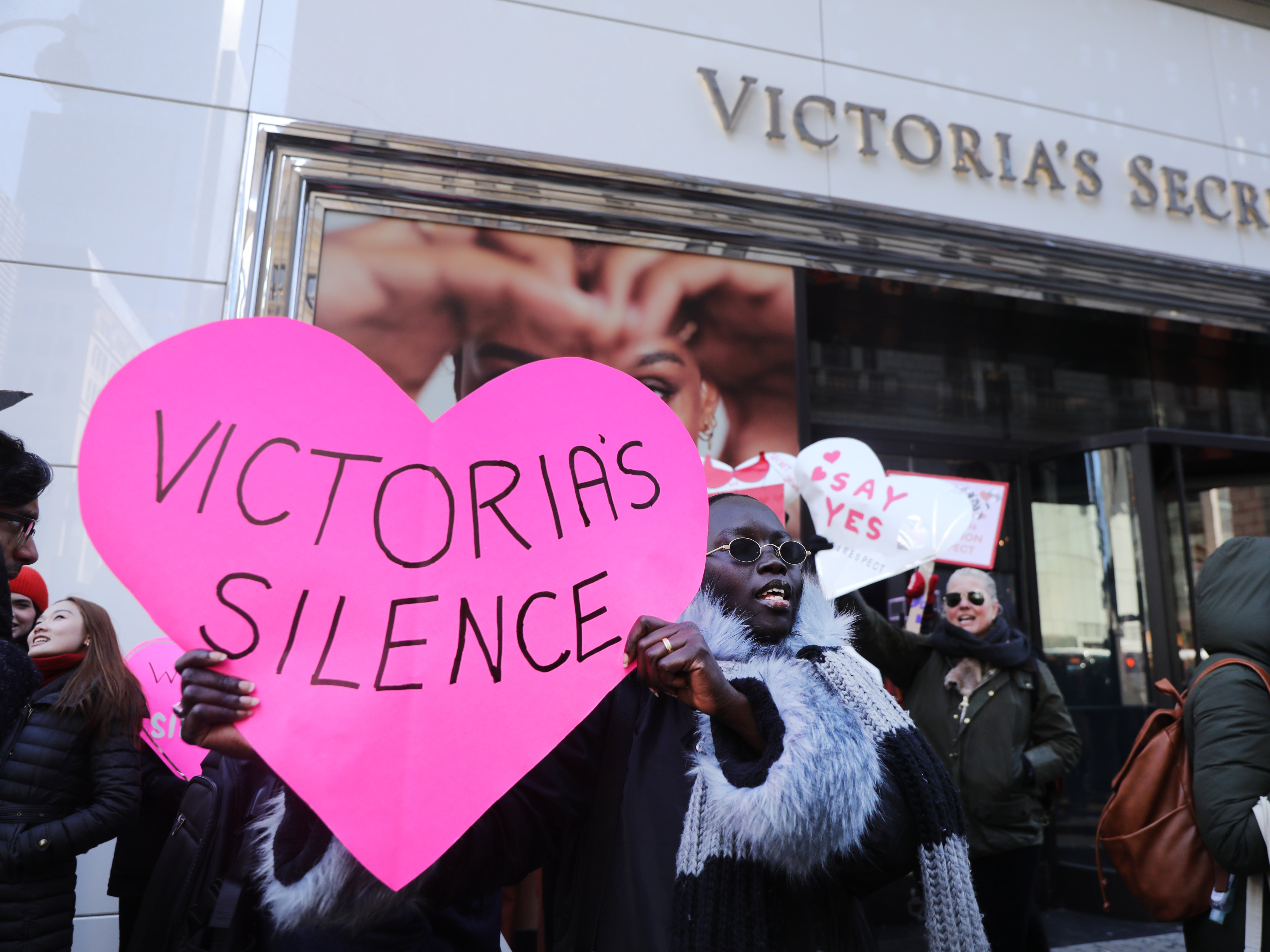 Men and women, some of them models, hold a demonstration outside of lingerie retailer Victoria's Secret on February 14, 2020 in New York City