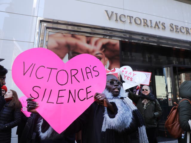 <p>Men and women, some of them models, hold a demonstration outside of lingerie retailer Victoria's Secret on February 14, 2020 in New York City</p>