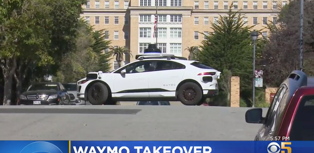<p>A Waymo self-driving car makes a multi-point turn on a dead-end San Francisco street</p>