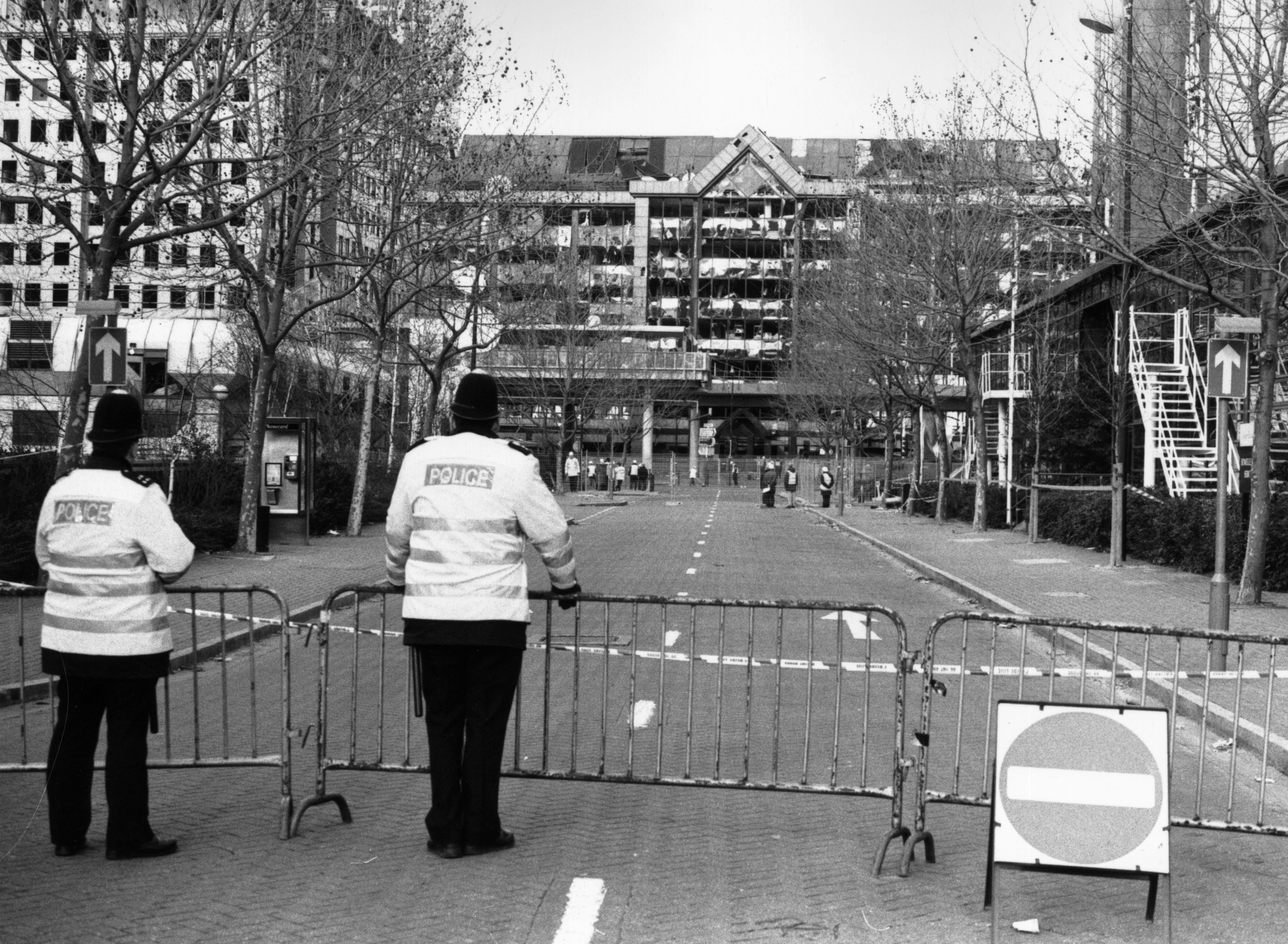 Police on duty at a cordoned-off street in Canary Wharf following the explosion of a bomb during the IRA ceasefire in February 1996