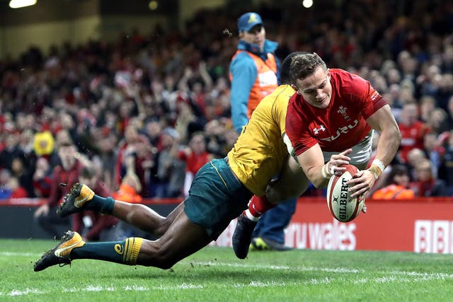 Wales full-back Hallam Amos (right) has announced his retirement at the age of 27 (David Davies/PA)