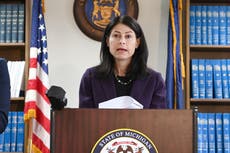 Michigan AG defends charges in man's death at mall in 2014