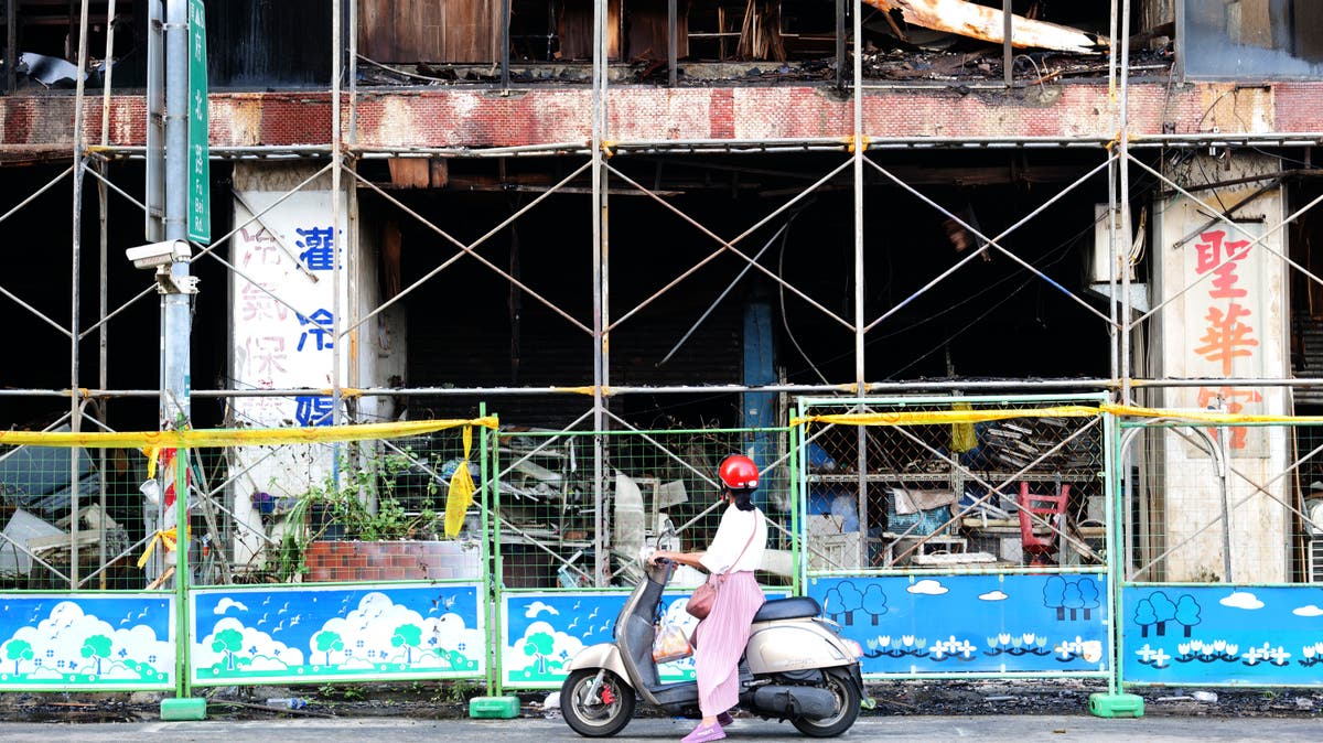 Officials seek cause of Taiwan building fire that killed 46