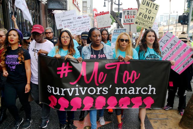 <p>File: Participants march against sexual assault and harassment during the #MeToo March </p>
