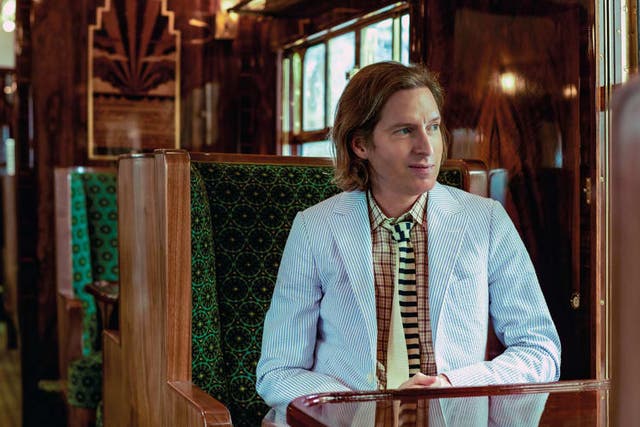 <p>Wes Anderson pictured in his Belmond train carriage</p>