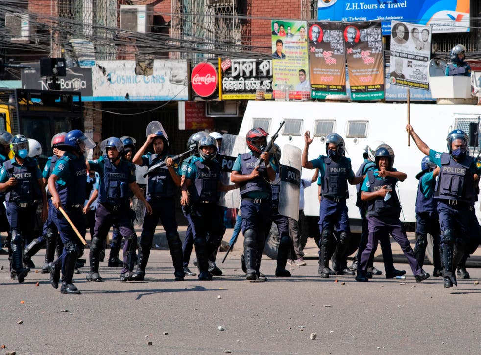 <p>Police clash with Muslim devotees during a protest  over an alleged insult to Islam, outside the country’ main Baitul Mukarram Mosque in Dhaka</p>