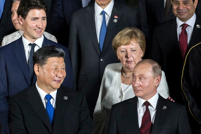 <p>Xi Jinping and Vladimir Putin at the G20 Summit in Osaka in 2019 </p>