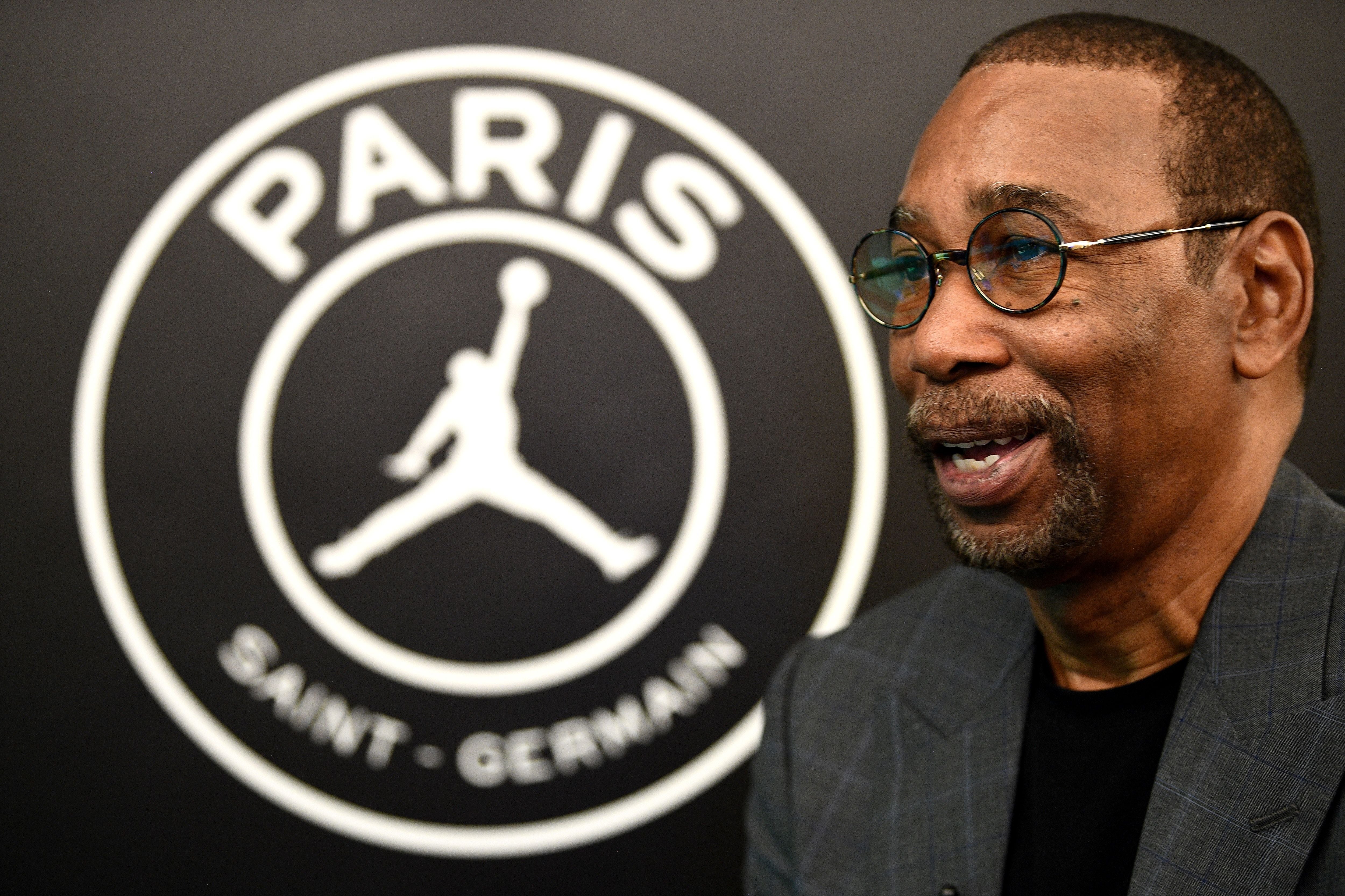 The Jordan Brand's Larry Miller speaks at the Parc des Princes stadium in Paris on September 13, 2018 during the presentation of Paris Saint-Germain's UEFA Champions League new jerseys made in partnership with the Jordan Brand, created by the Chicago Bulls' basketball legend. (