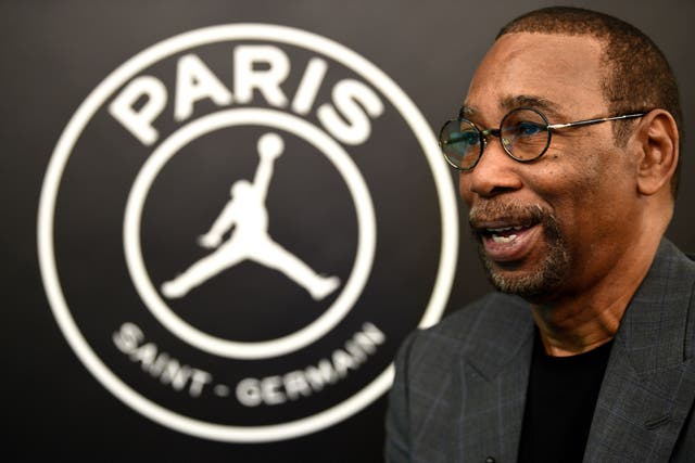 <p>The Jordan Brand's Larry Miller speaks at the Parc des Princes stadium in Paris on September 13, 2018 during the presentation of Paris Saint-Germain's UEFA Champions League new jerseys made in partnership with the Jordan Brand, created by the Chicago Bulls' basketball legend. (</p>