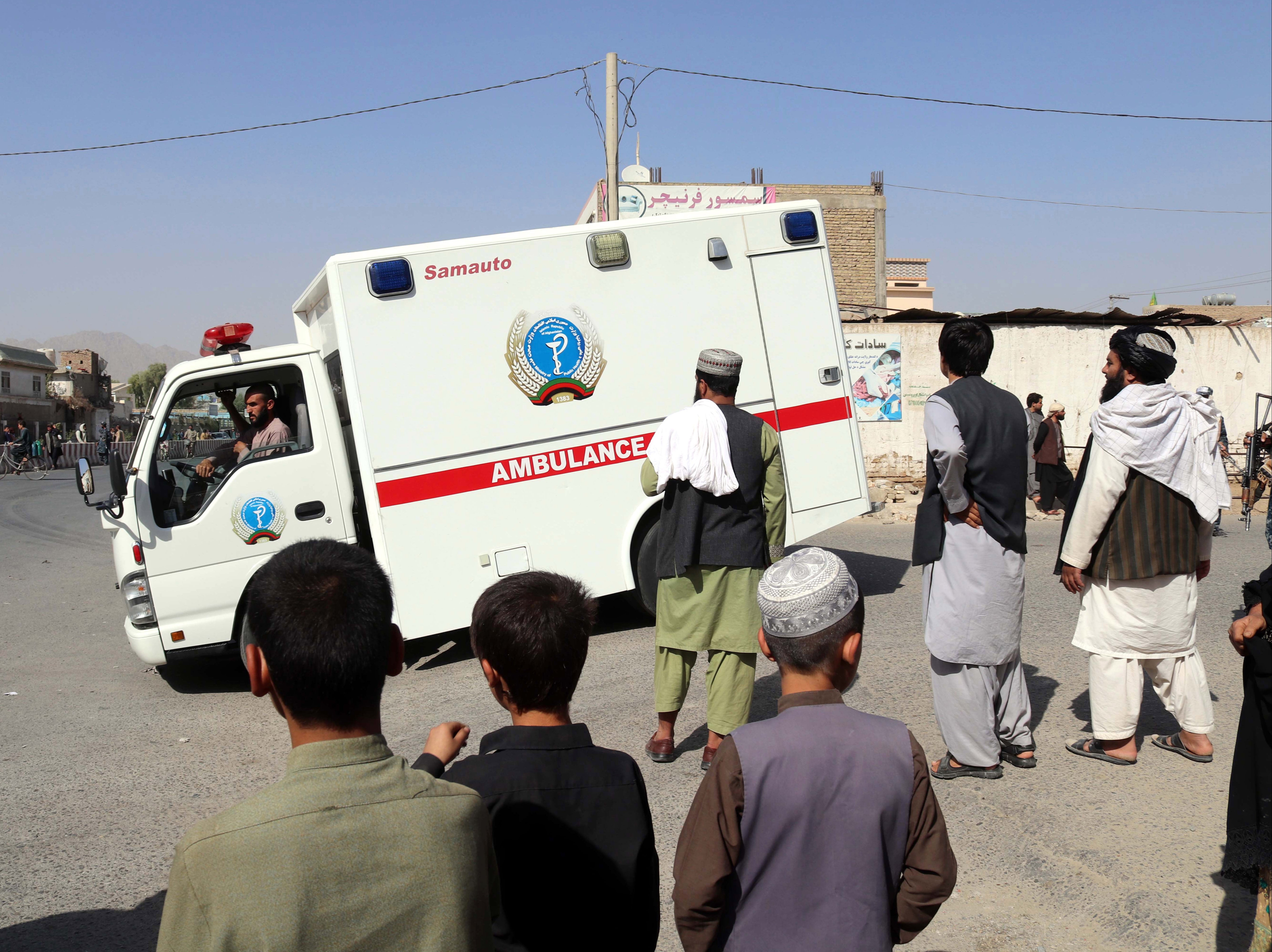 The wounded are taken to hospital after the blasts on Friday