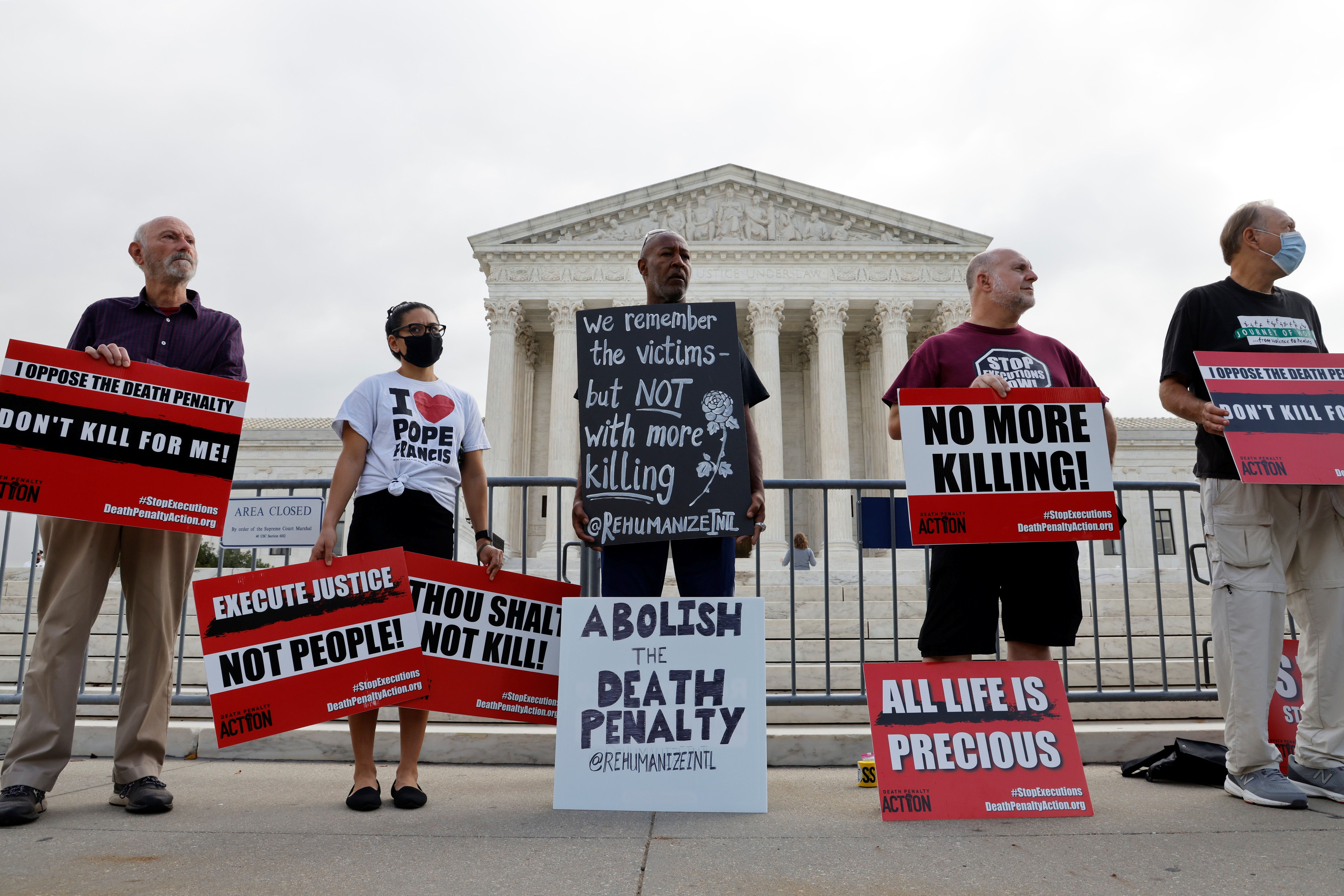 Demonstrators rally against the death penalty outside the US Supreme Court in Washington DC