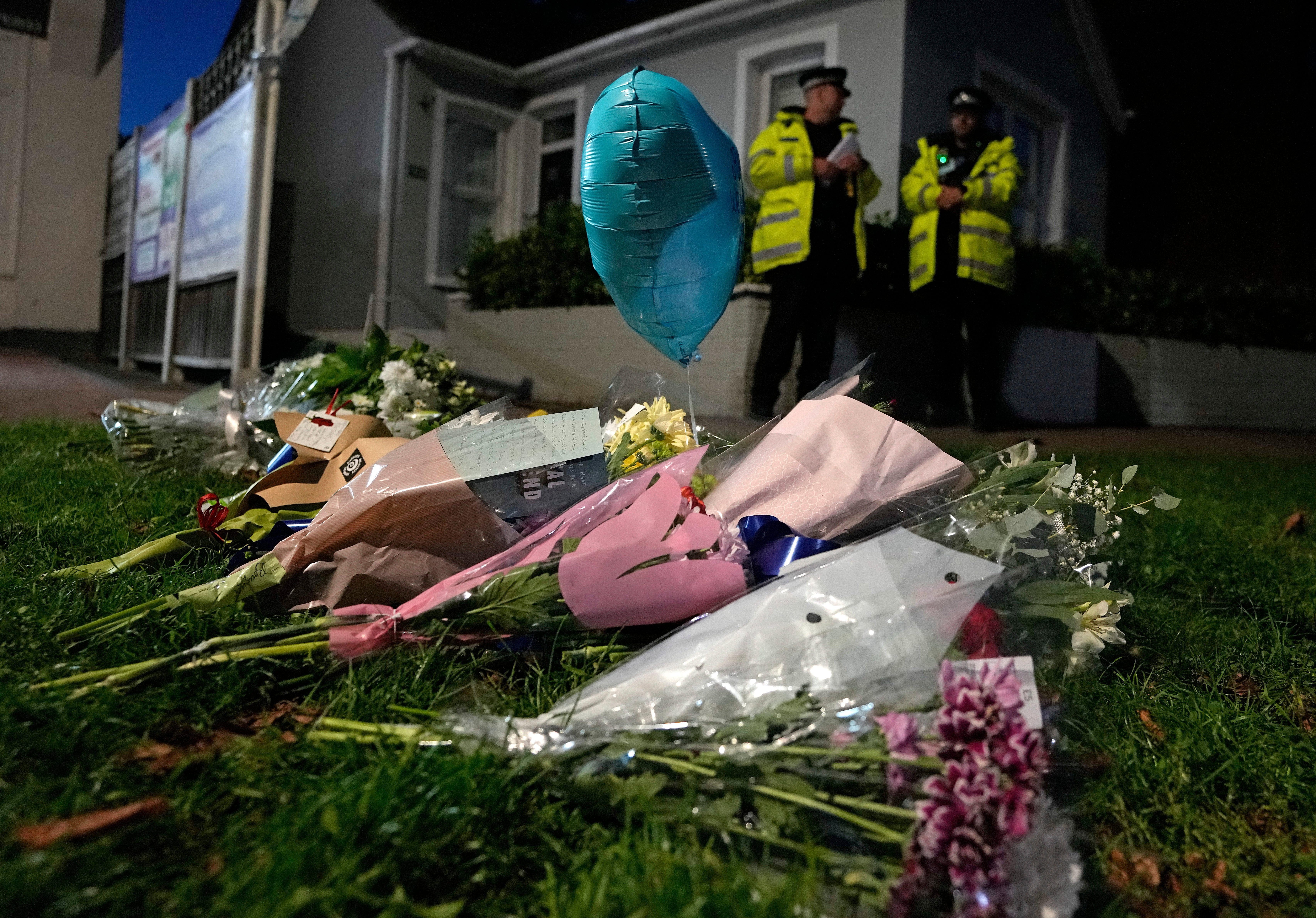 <p>Floral tributes are placed on one of the roads leading to the Belfairs Methodist Church</p>