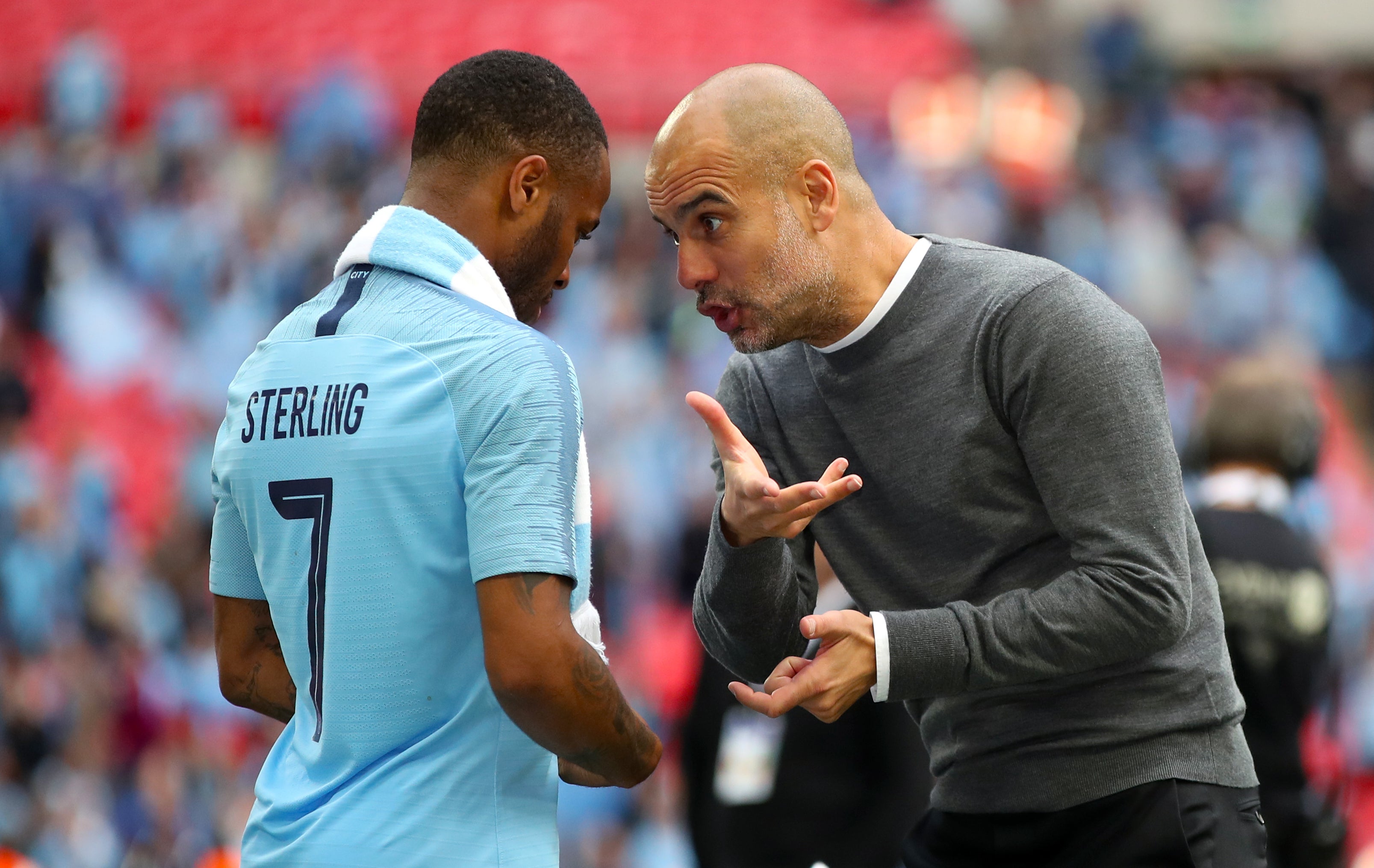 Pep Guardiola, right, has backed Raheem Sterling, left, to rediscover his best (Nick Potts/PA)