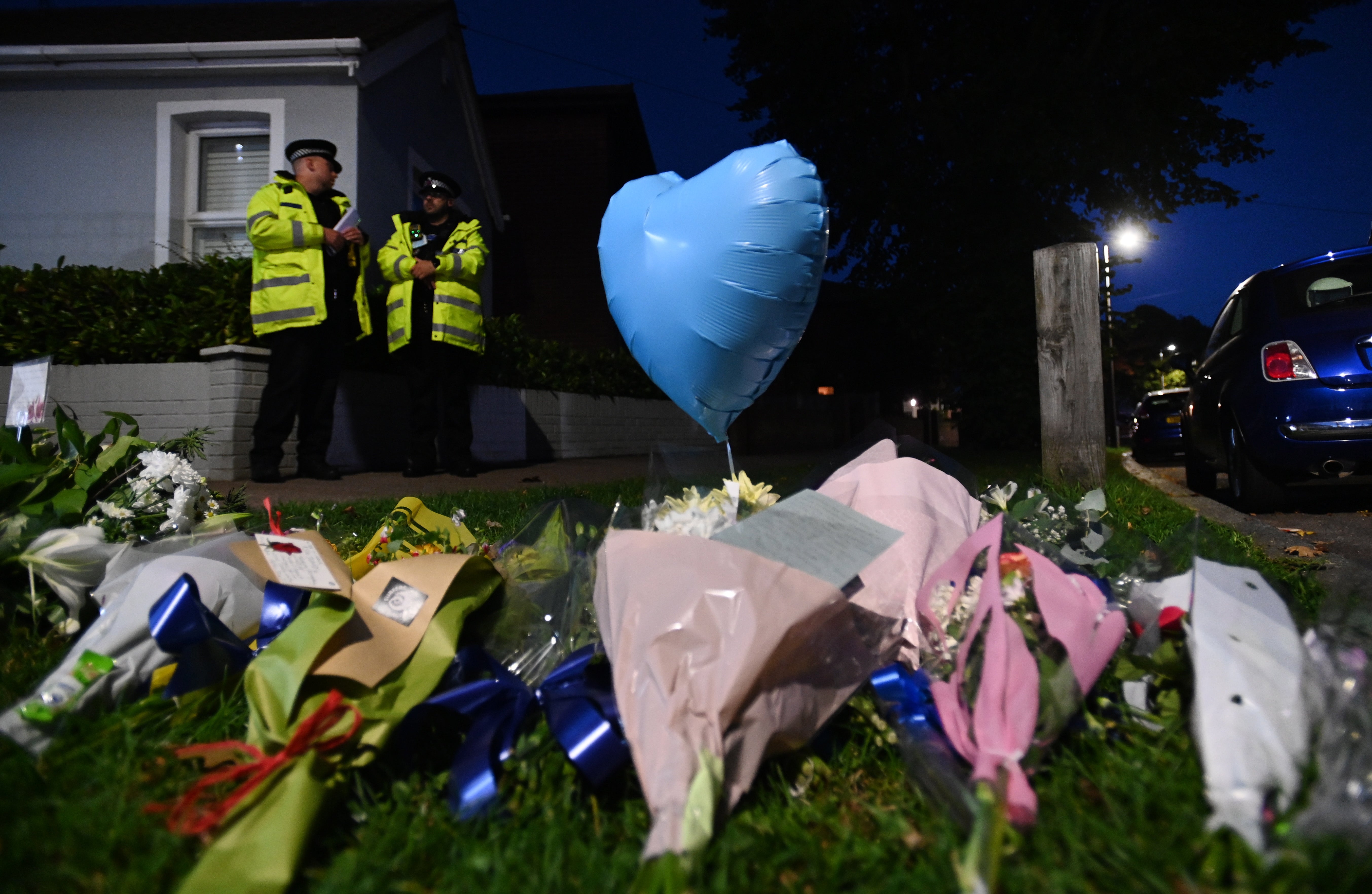 Floral tributes at the scene where the MP for Southend West, Sir David Amess, was stabbed to death in Leigh-on-Sea